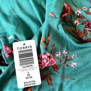 Torrid maxi dress. New with tags. Never worn. Size 3. Adjustable straps.